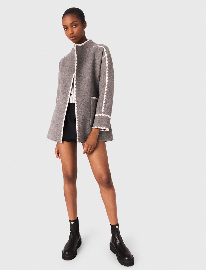 Double-faced coat with trim 5