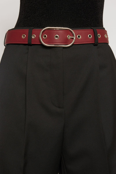 Acne Studios Studded leather belt burgundy outlook