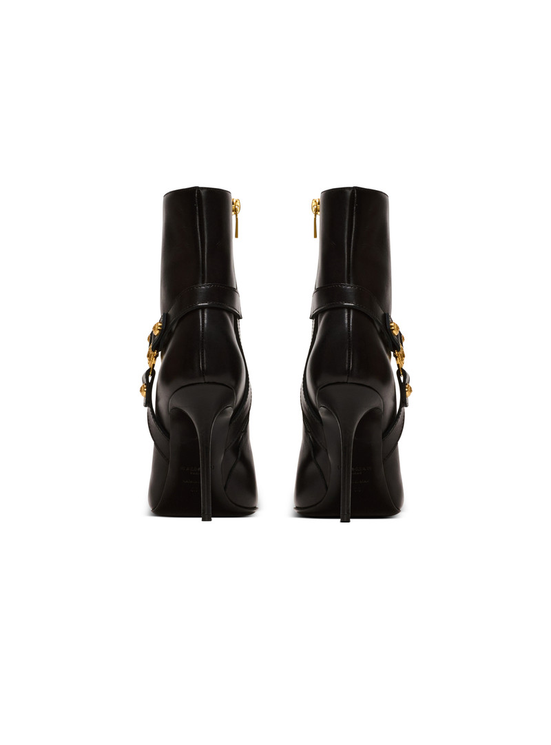 Heeled calfskin Eva ankle boots 4