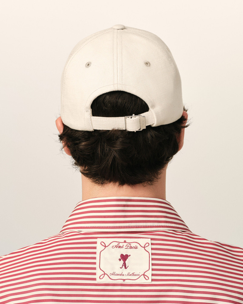 WHITE COTTON CAP WITH AMI DE COEUR ARROW 6