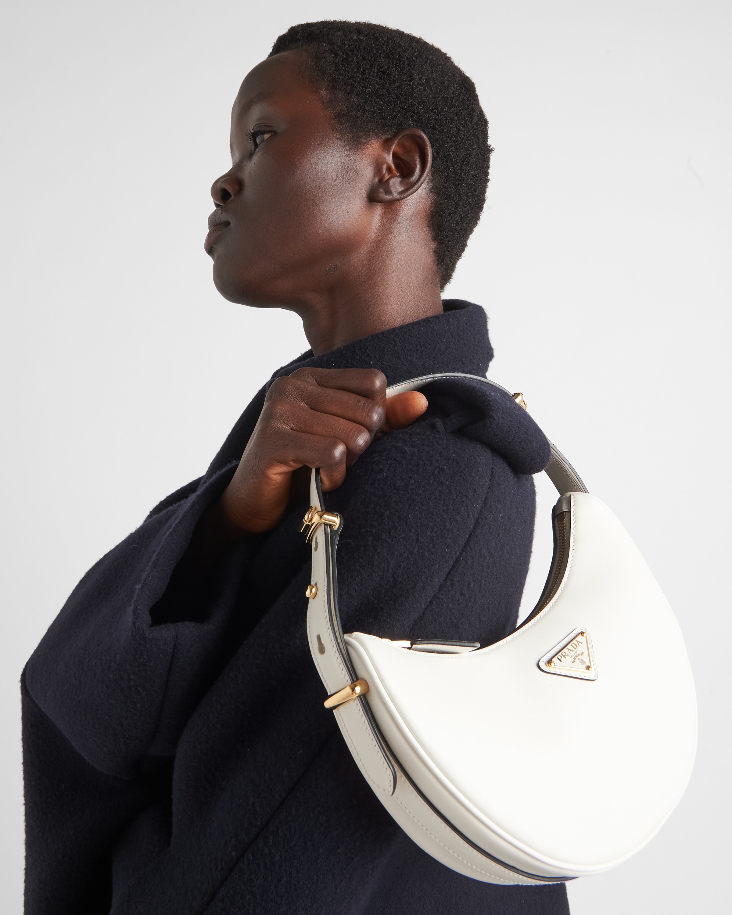 Prada Prada Arqué leather shoulder bag | REVERSIBLE