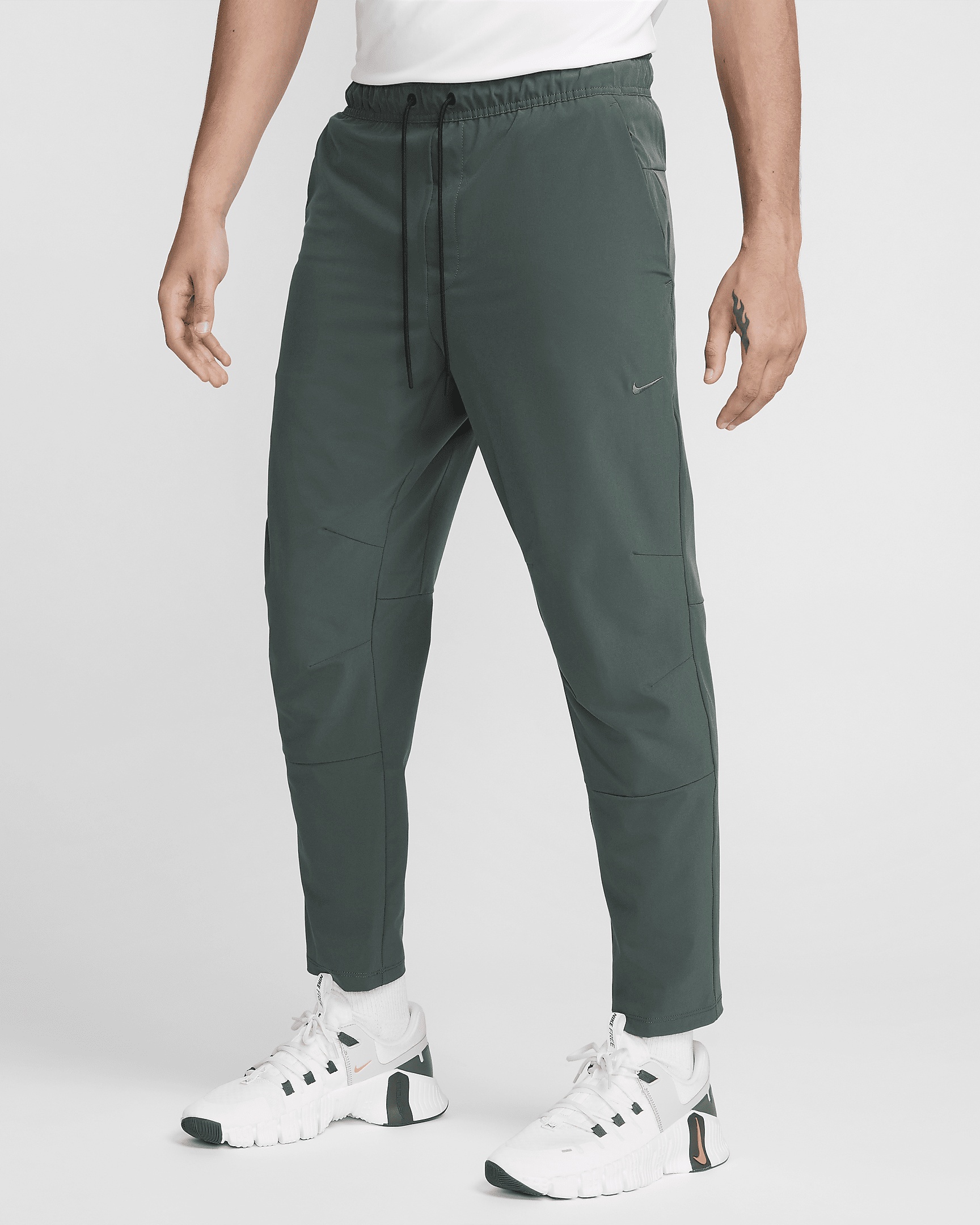 Nike Unlimited Men's Dri-FIT Tapered Leg Versatile Pants - 1