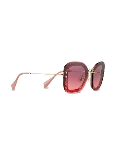 Miu Miu Reveal oversized glitter frame sunglasses outlook