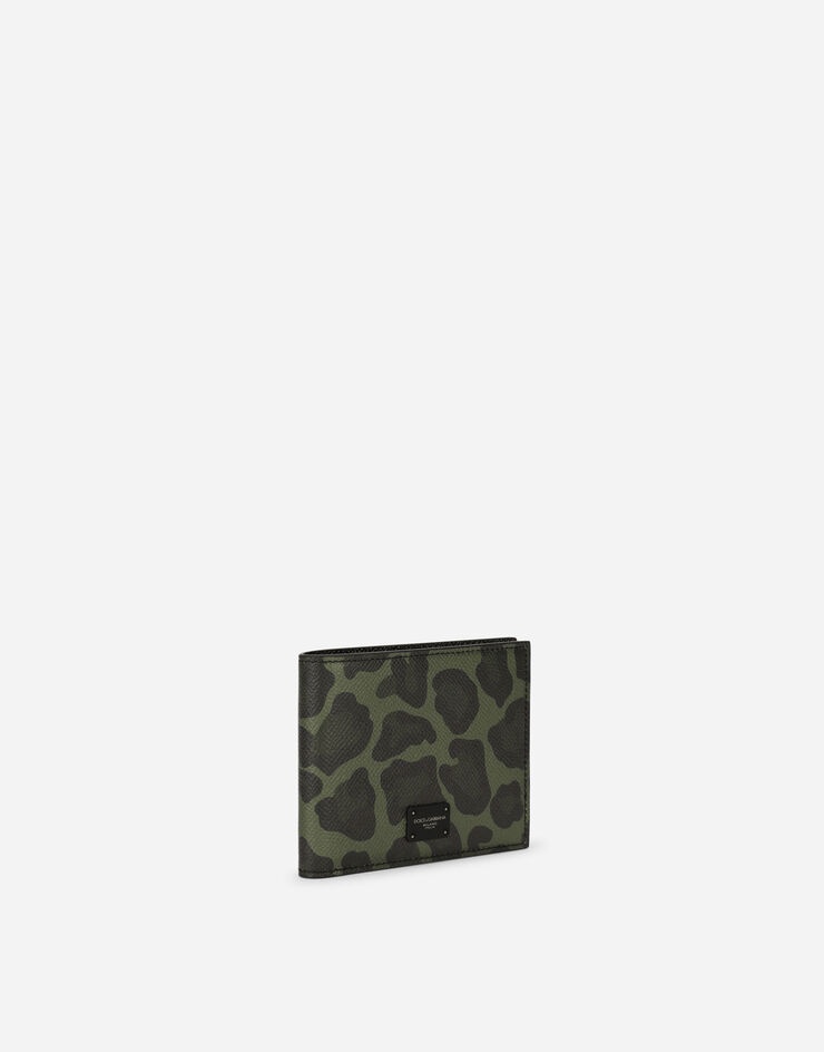 Dauphine calfskin bifold wallet with leopard print against a green background - 2