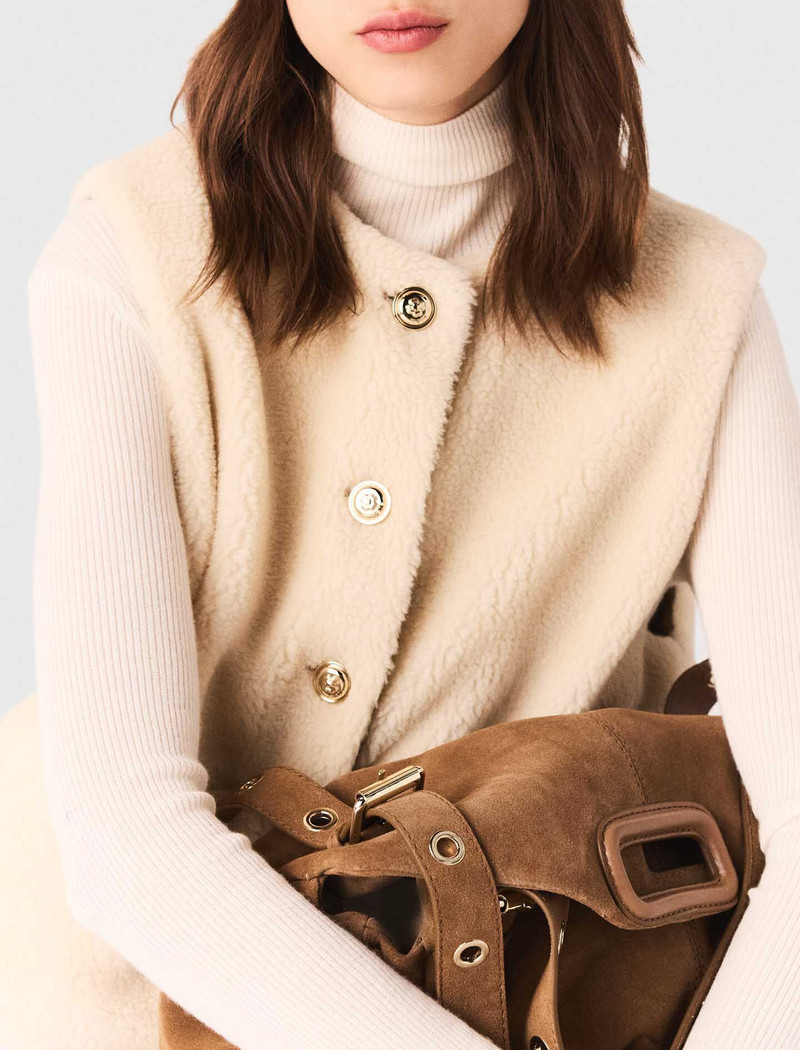 Short sleeveless puffer jacket 8
