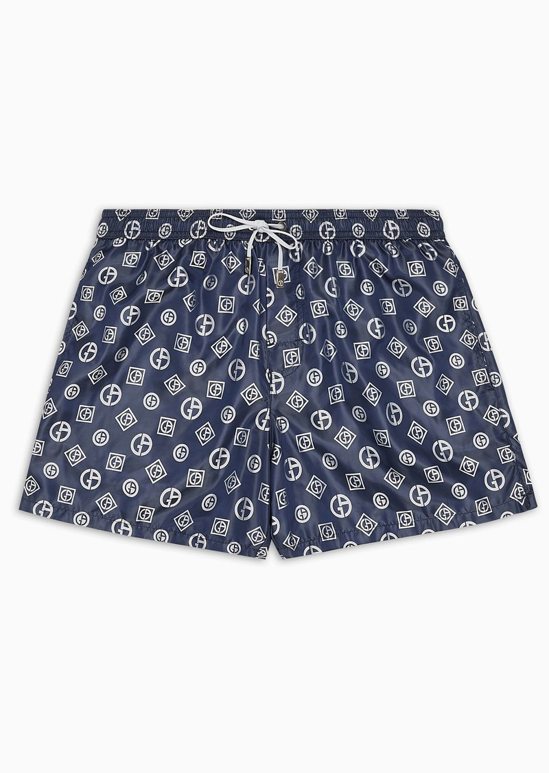 Swim trunks with an all-over logo jacquard 1