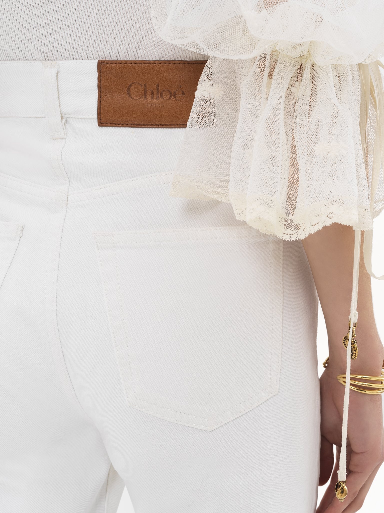 HIGH-RISE FLARE JEANS IN DENIM - 7