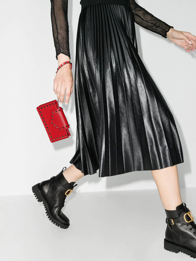 Valentino Rockstud-embellished clutch bag outlook