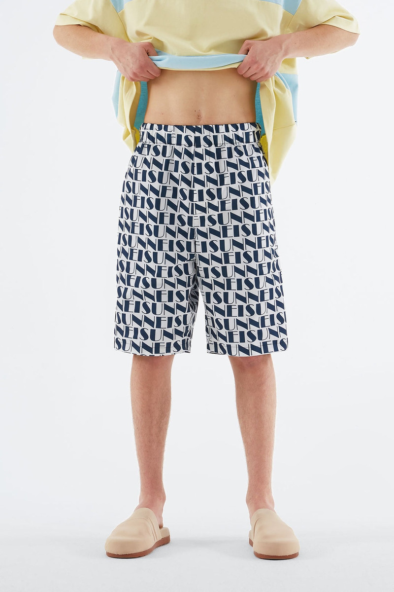 SUNNEI REVERSIBLE NAVY & WHITE LOGO BERMUDA PANTS outlook