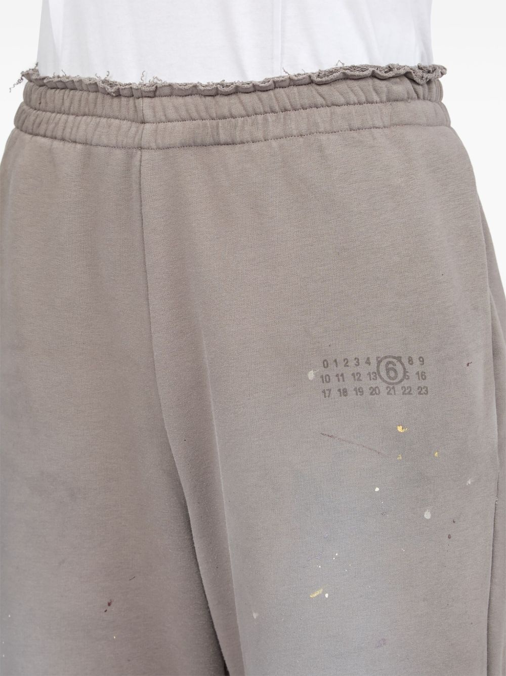 paint-splatter track pants - 7