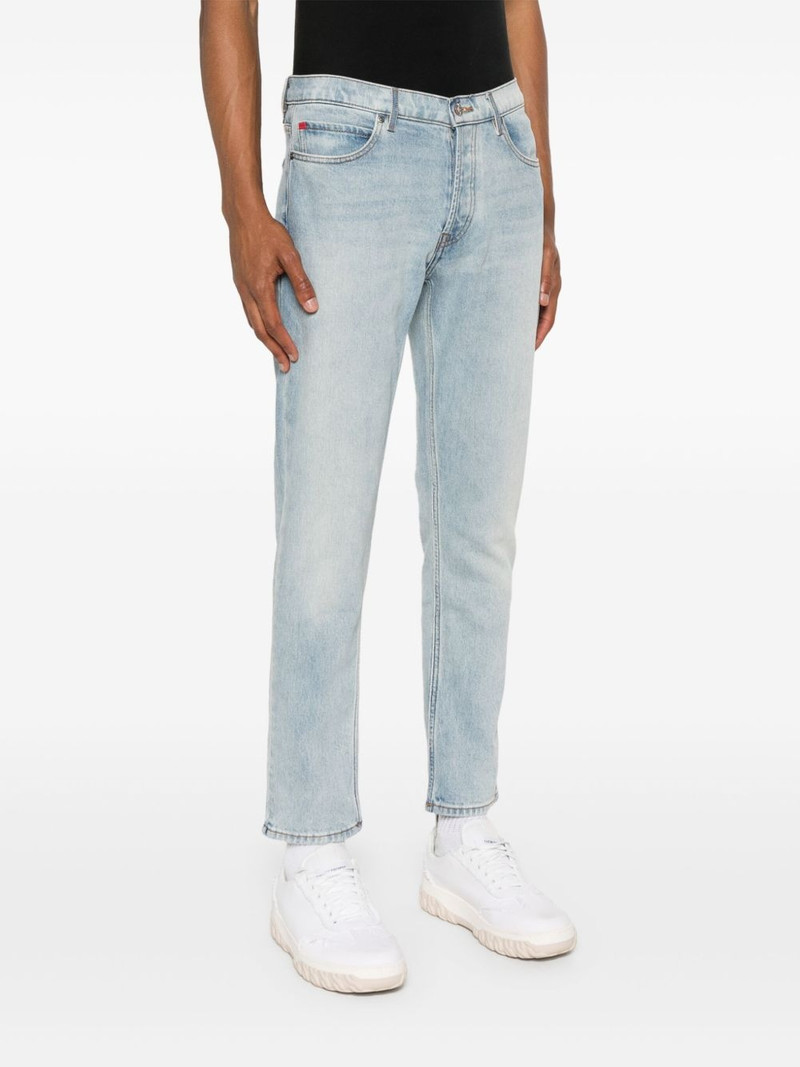 slim-leg cotton-blend jeans 3