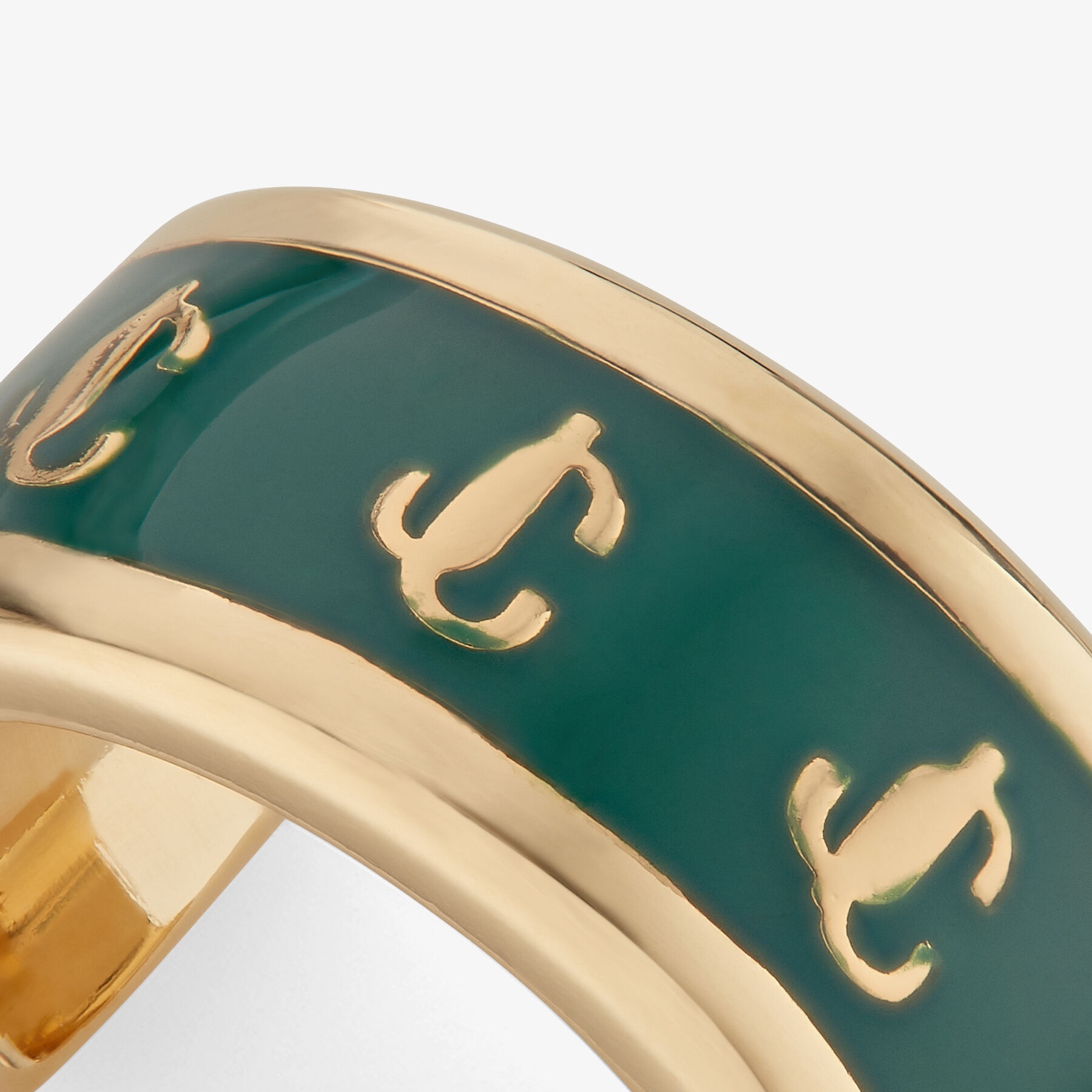 Single JC Ear Cuff
Gold-Finish Metal and Emerald Enamel JC Ear Cuff - 5