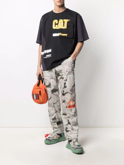 Heron Preston x CATERPILLAR logo-print T-shirt outlook