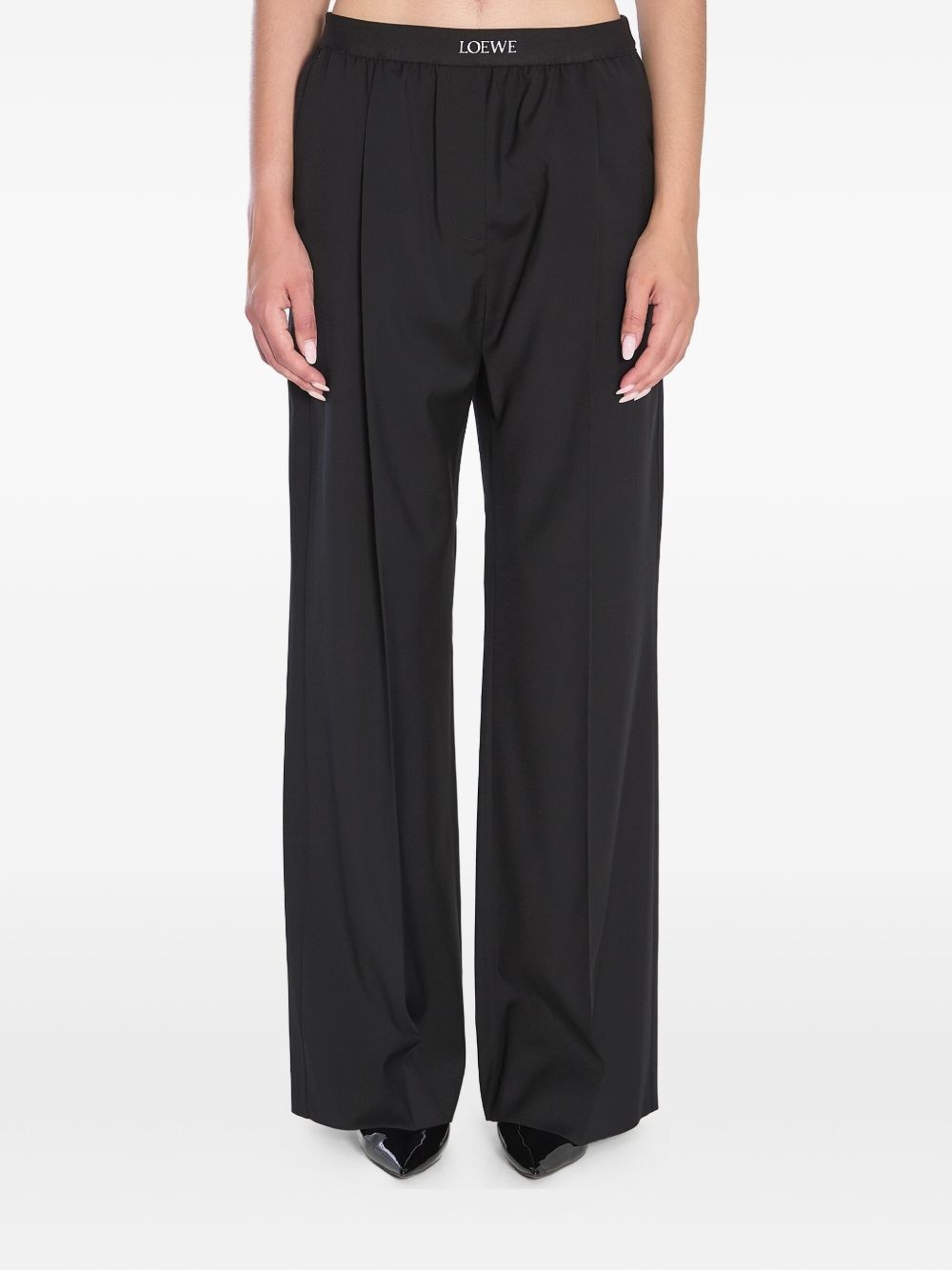 elasticated-waistband pleated trousers - 1