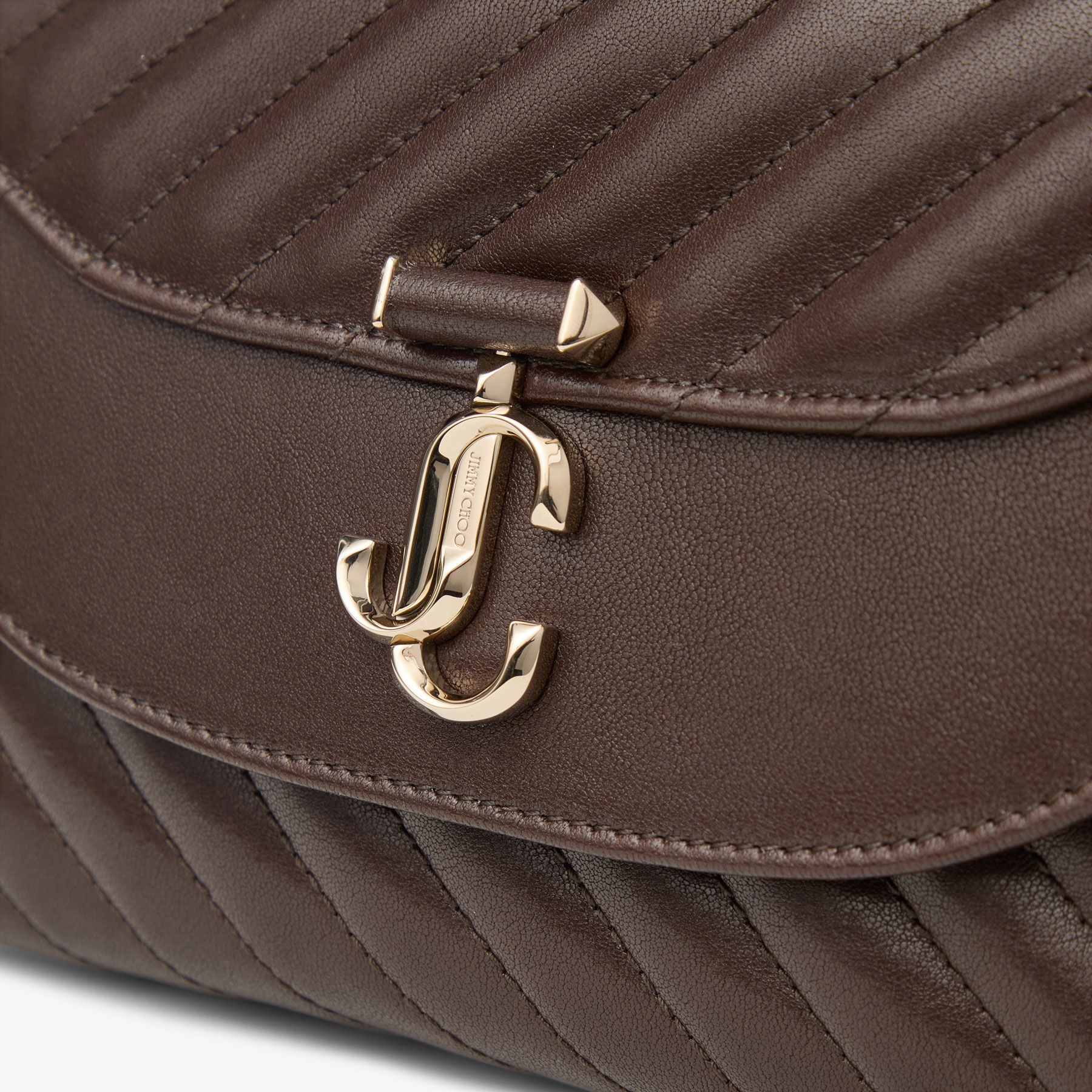 Curve Top Handle
Chocolate Quilted Biker Leather Shoulder Bag with Pearl Embellishments - 3