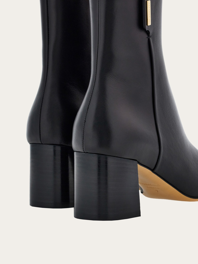 Ankle boot with golden tab 7