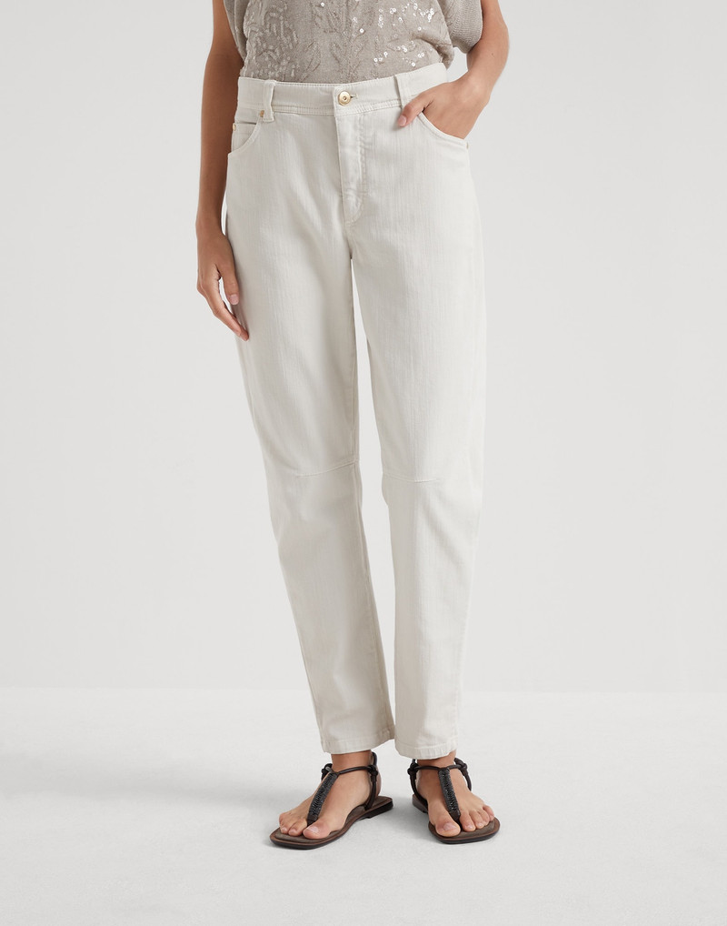 Stretch dyed denim slim tapered trousers with monili 1