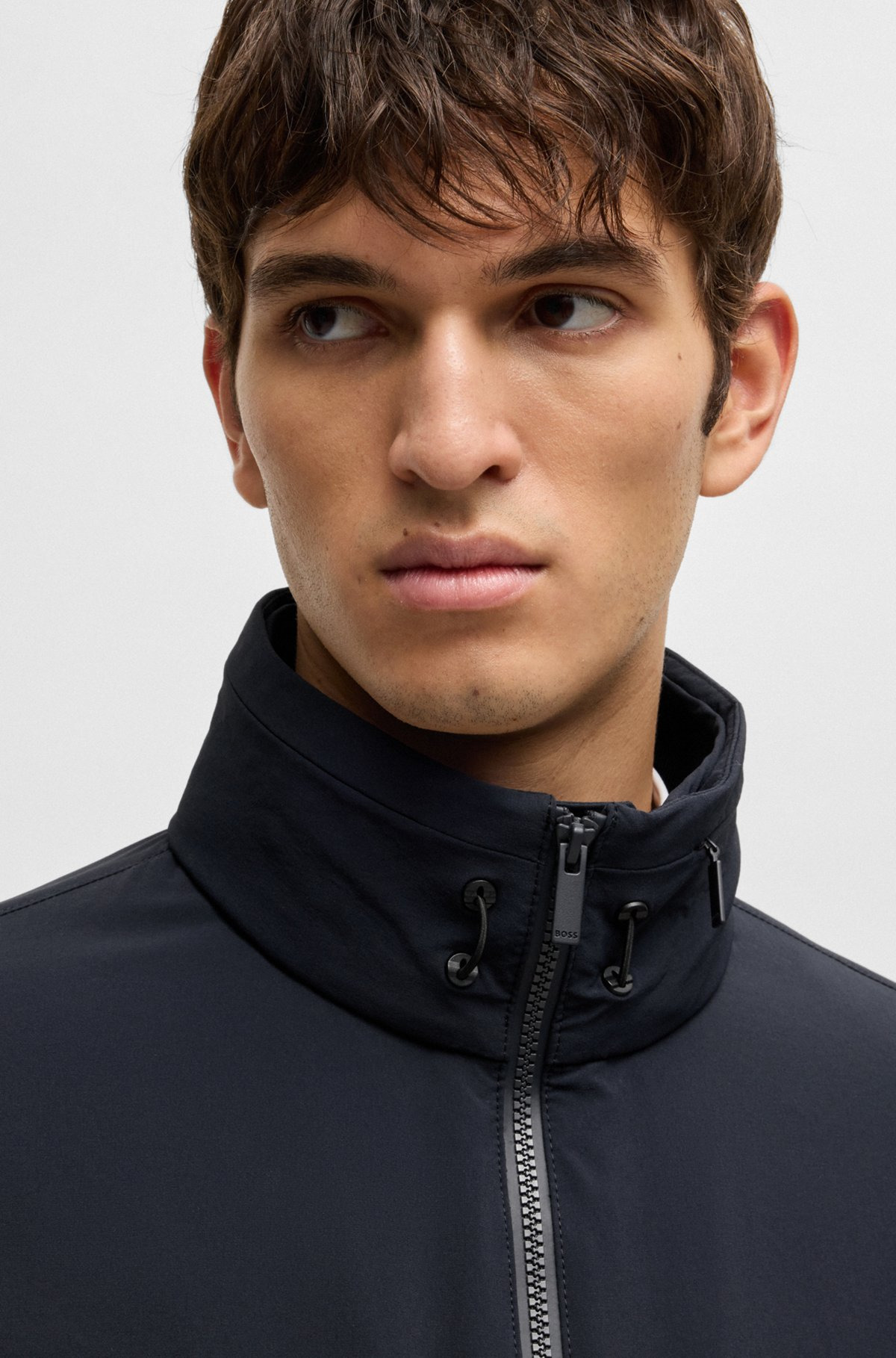 SOFTSHELL JACKET IN WASHABLE STRETCH FABRIC WITH PACKABLE HOOD - 5