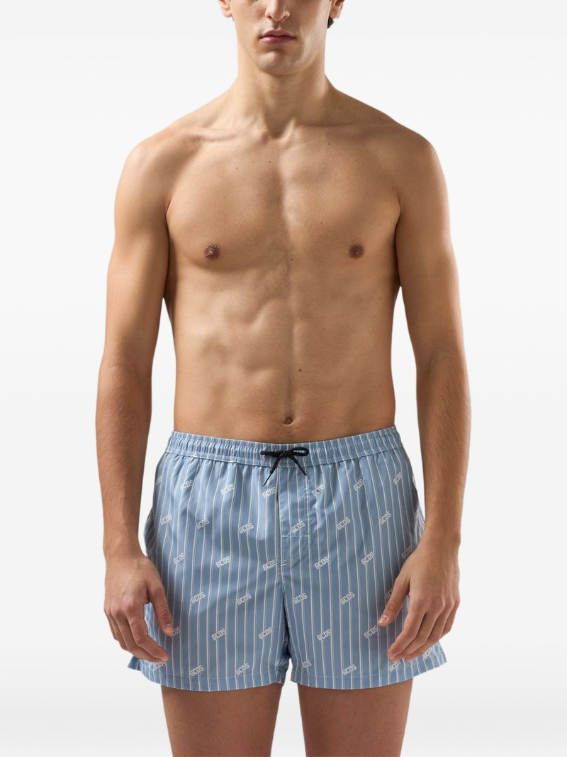 GCDS pinstripe swim shorts outlook