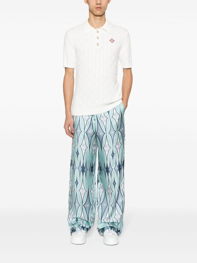 AMIRI argyle-print silk trousers outlook