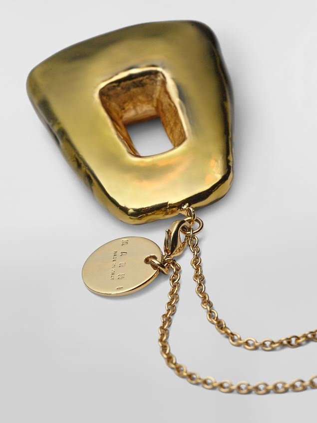 GOLD-TONE METAL TRAPEZE NECKLACE WITH TRANSPARENT ENAMEL-COVERED PENDANT - 3