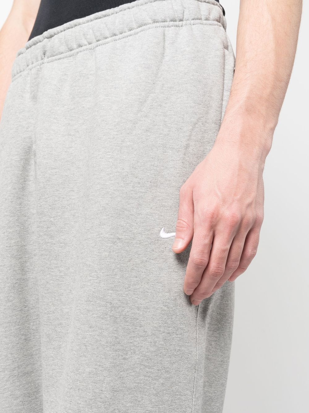Swoosh logo-embroidery track pants - 5