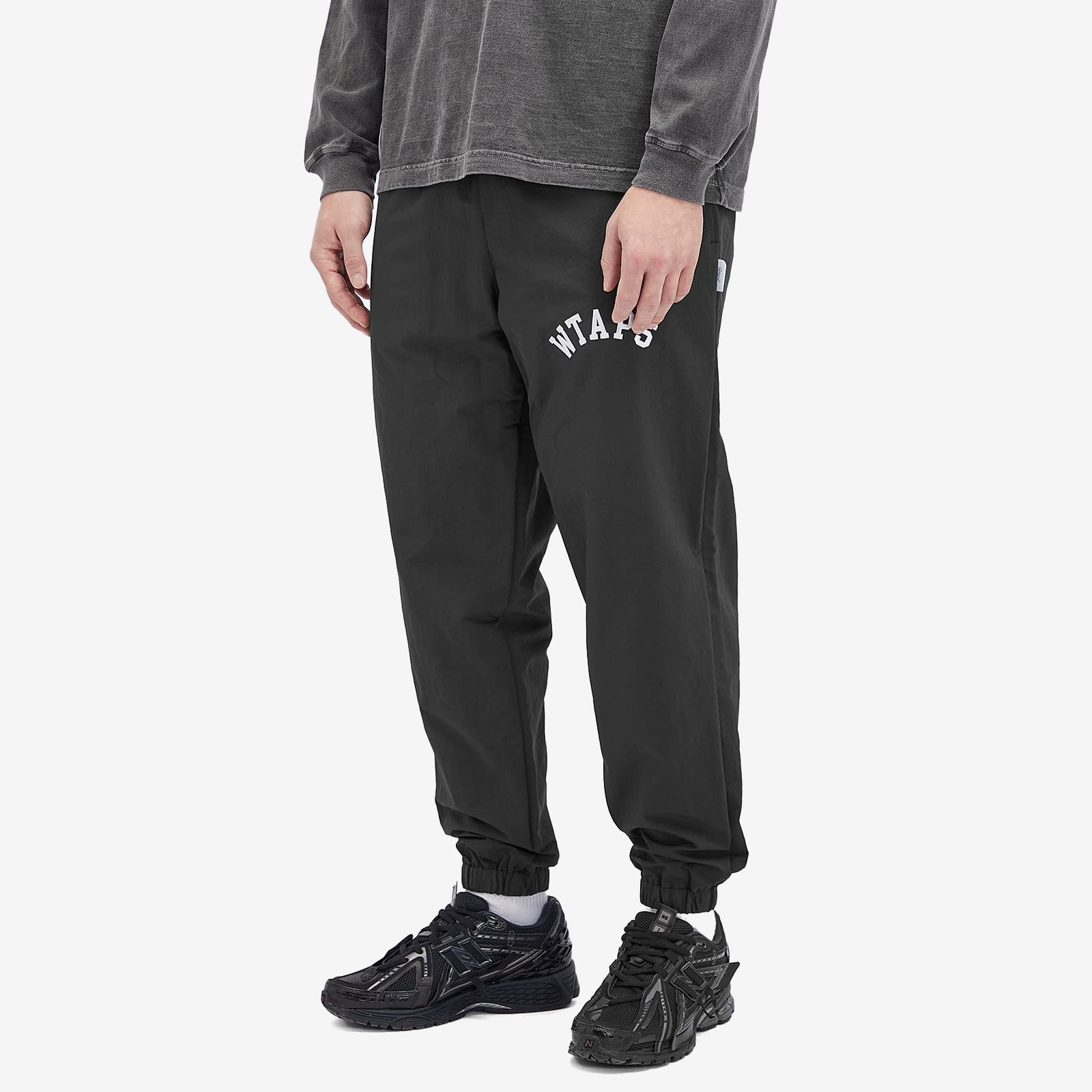 WTAPS WTAPS 03 Logo Embroidered Nylon Track Pants | REVERSIBLE