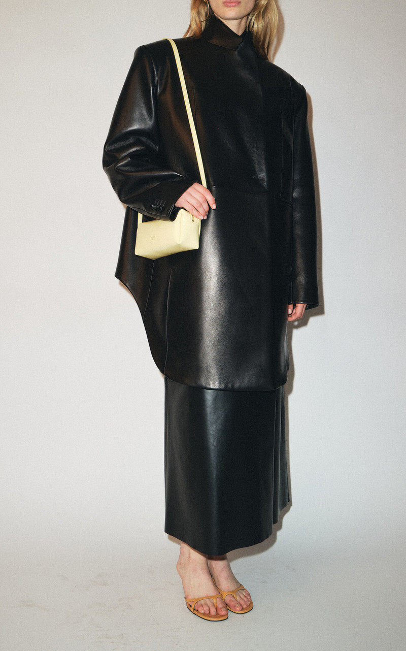 KHAITE Kye Mini Crossbody Bag yellow outlook