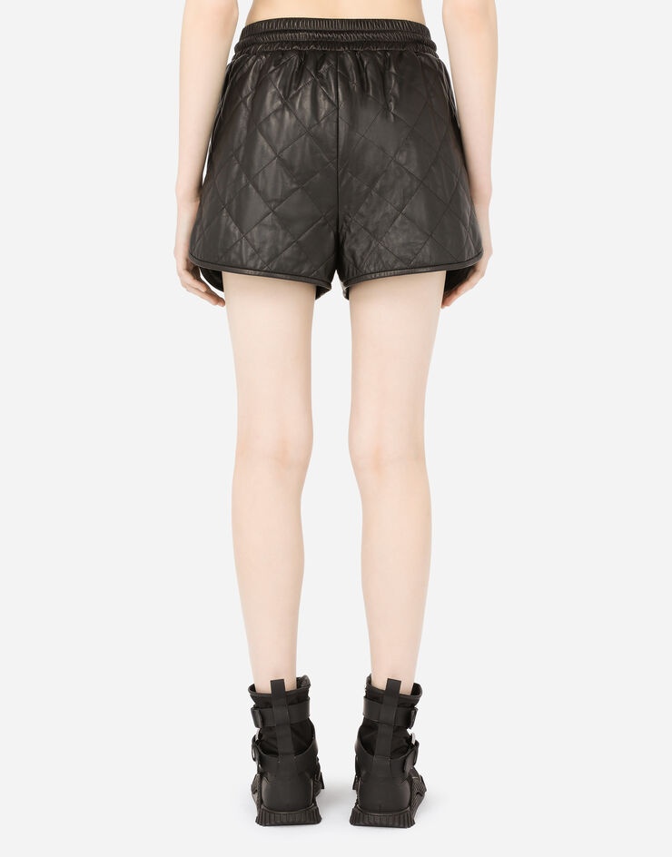 Quilted leather shorts with DG pendant - 2