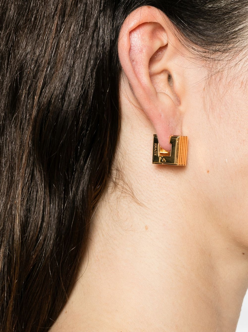 KHAITE small Empire engraved logo earrings outlook