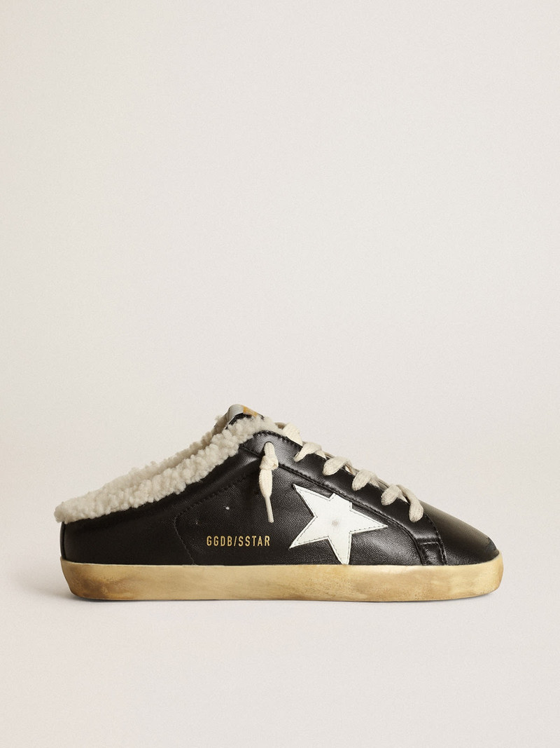 Super-Star Sabots in black nappa leather with white leather star and beige shearling lining - 1