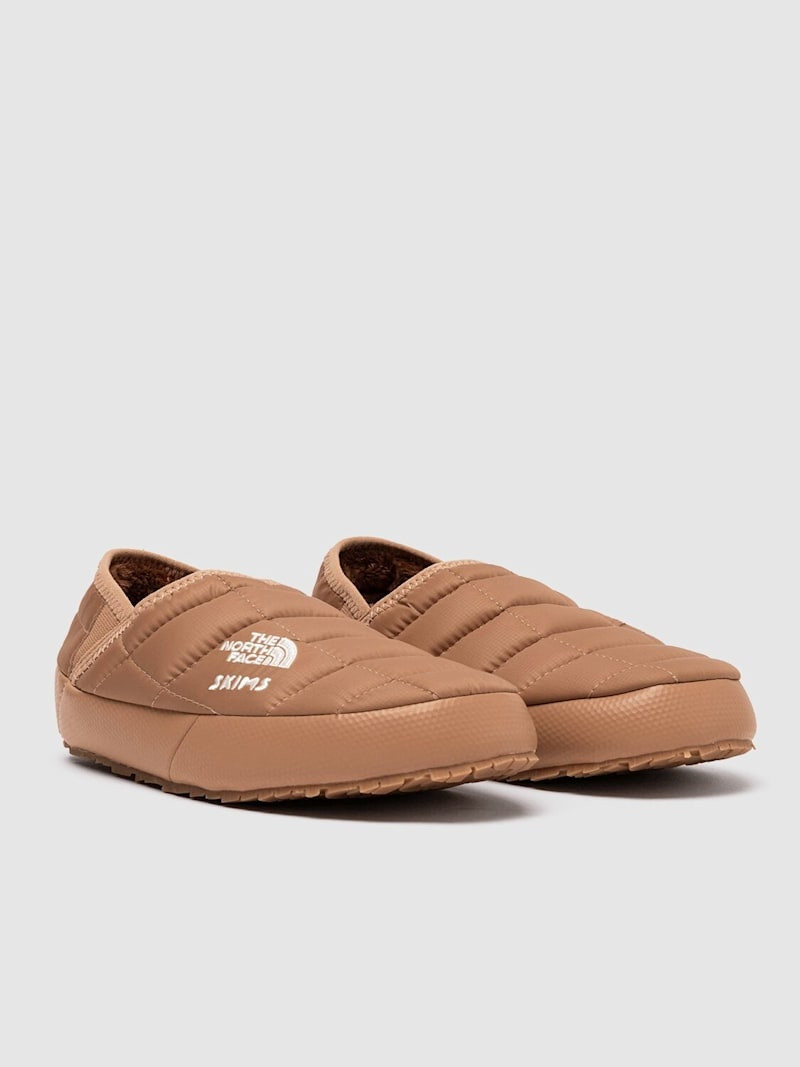 The North Face SKIMS Thermoball Traction mules outlook
