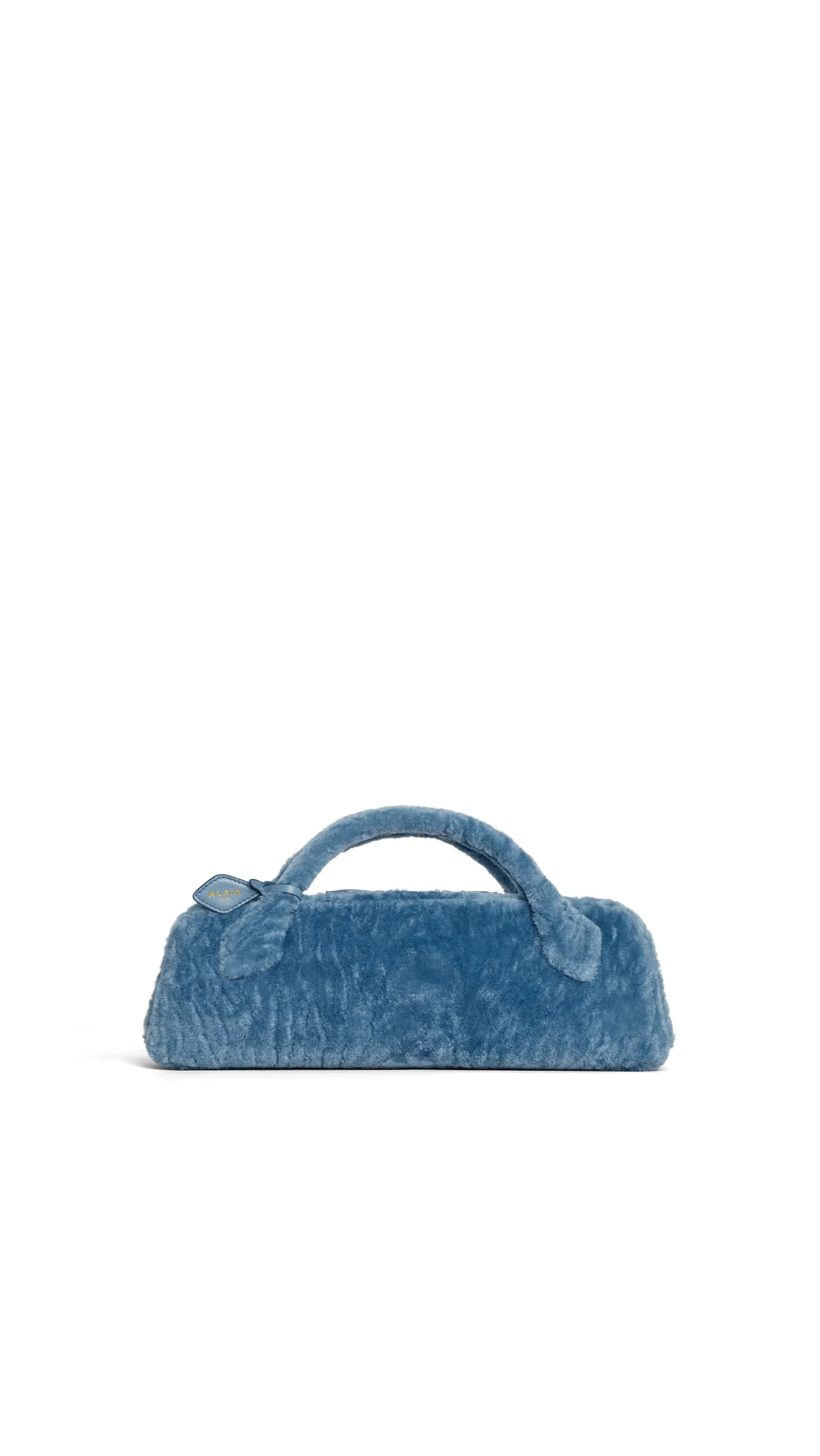 LE TECKEL CLUTCH IN SHAVED SHEARLING - 1