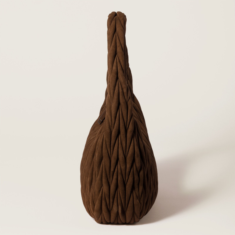 Wander matelassé suede bag 5