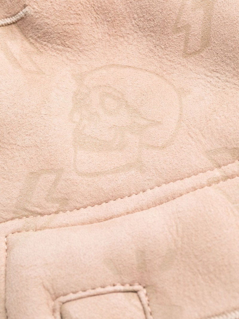 monogram-embossed long shearling coat 7