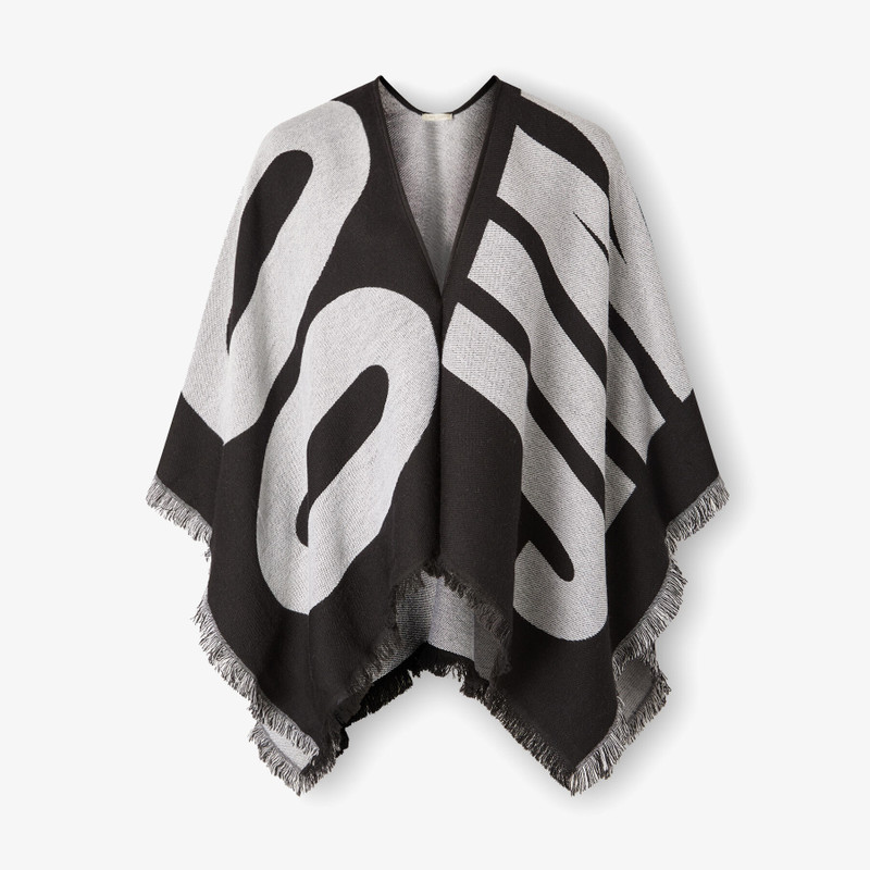 Juul
Black Woven Knitted Wool Poncho 1