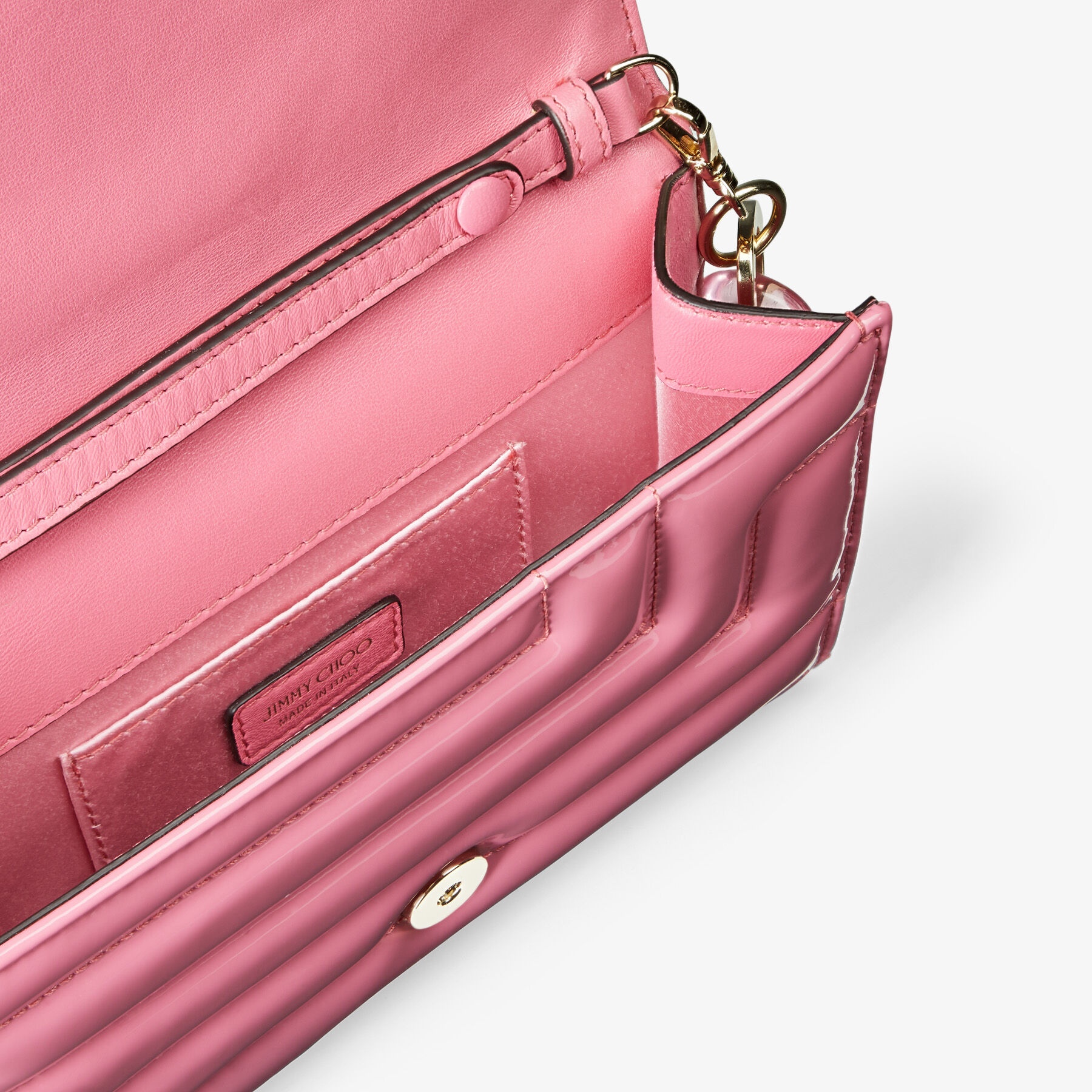 Varenne Avenue Clutch
Candy Pink Quilted Patent Clutch with Plexi Strap - 5