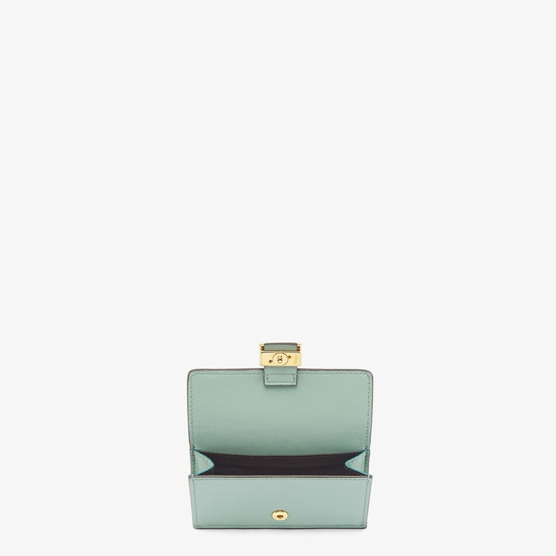 FENDI Baguette cardholder with three card slots and coin pocket with snap button. Made of mint green nappa outlook