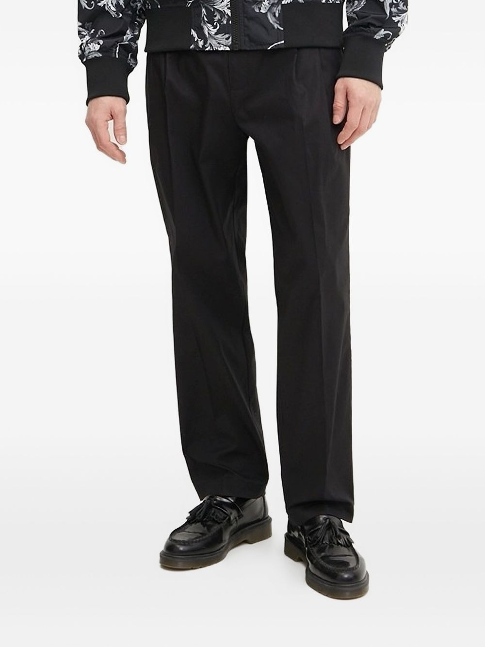 logo-appliqué pleat-detail trousers - 1