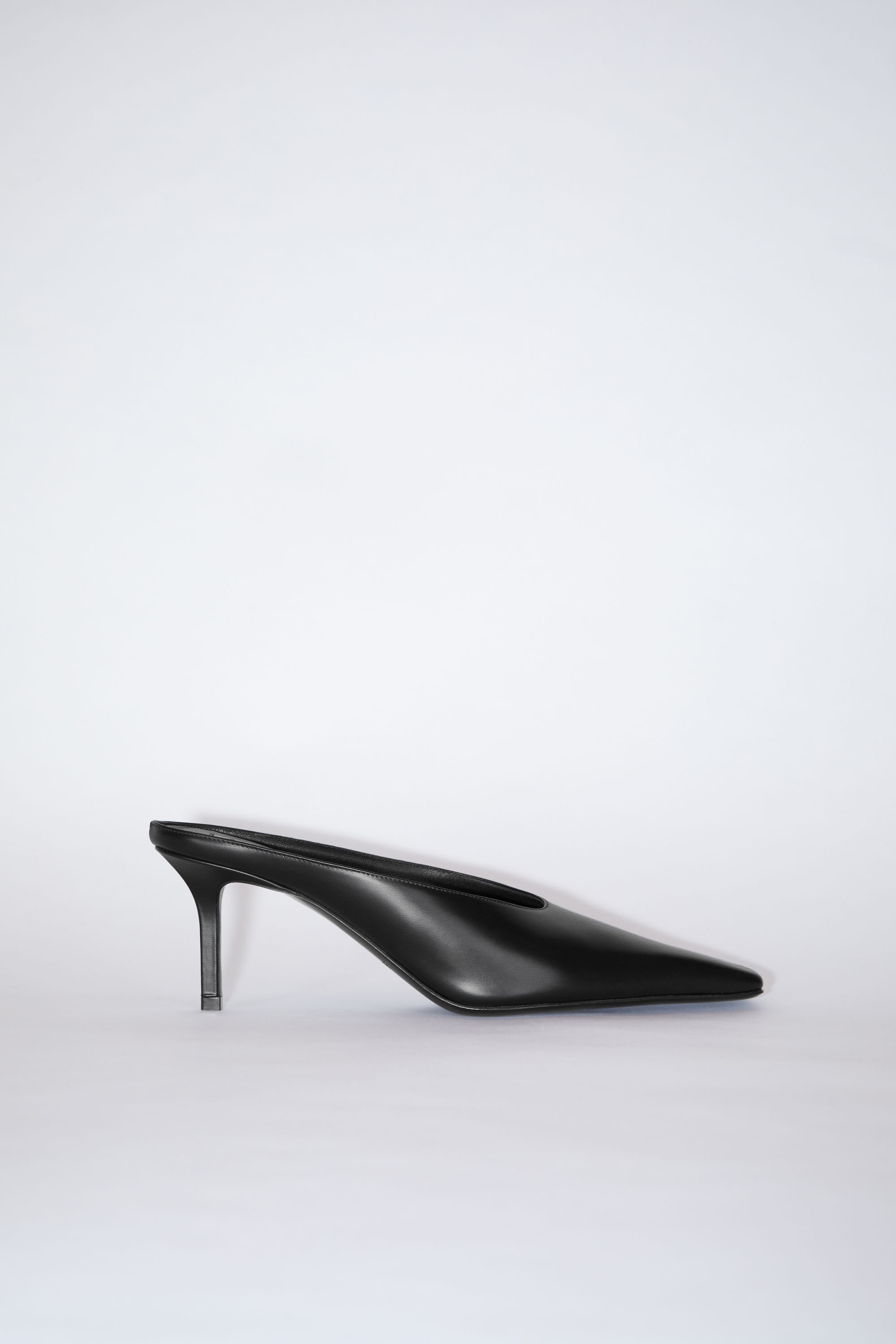 Heeled leather mules - Black - 1