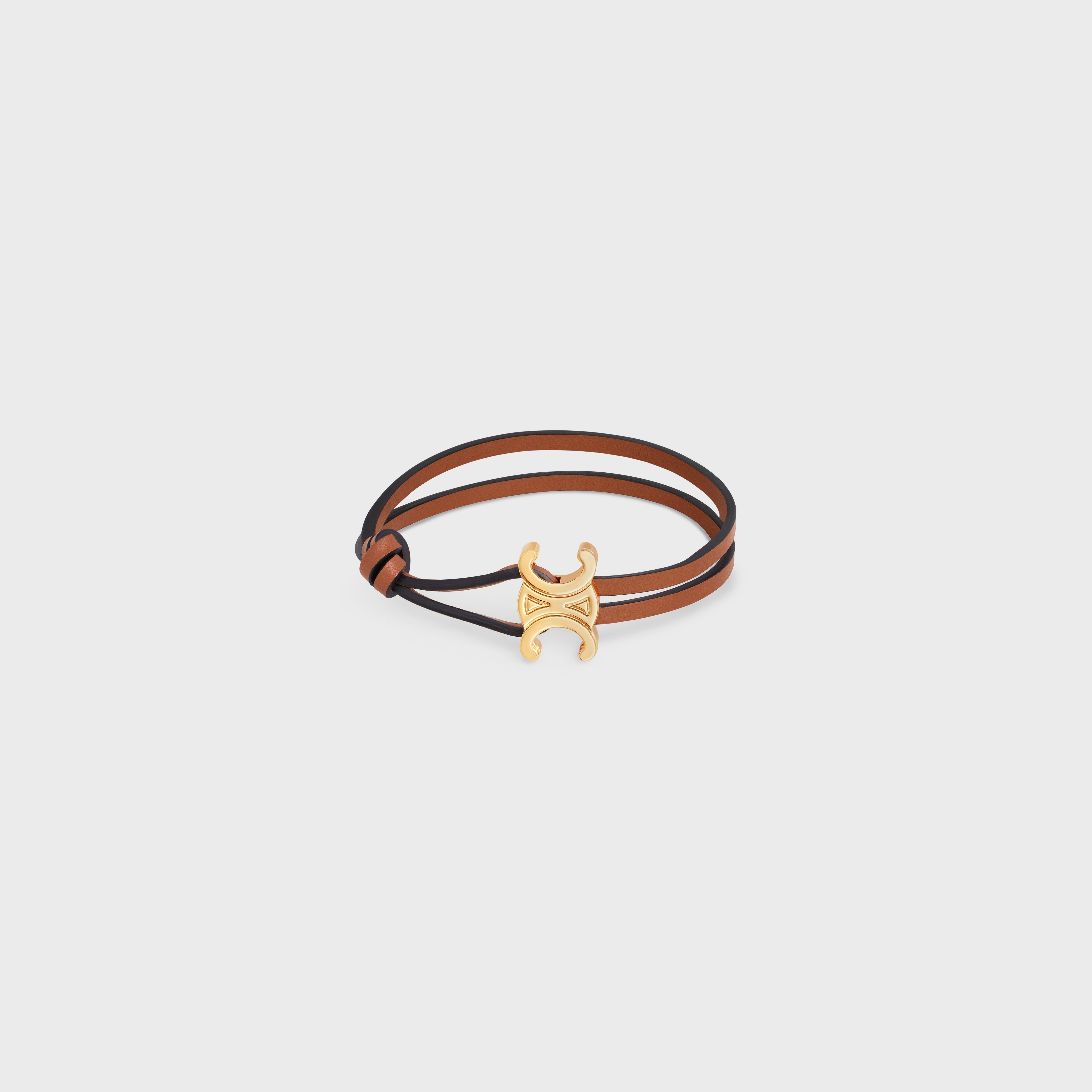 Triomphe Clasp Bracelet in Brass with Gold Finish and Tan Smooth Calfskin - 1