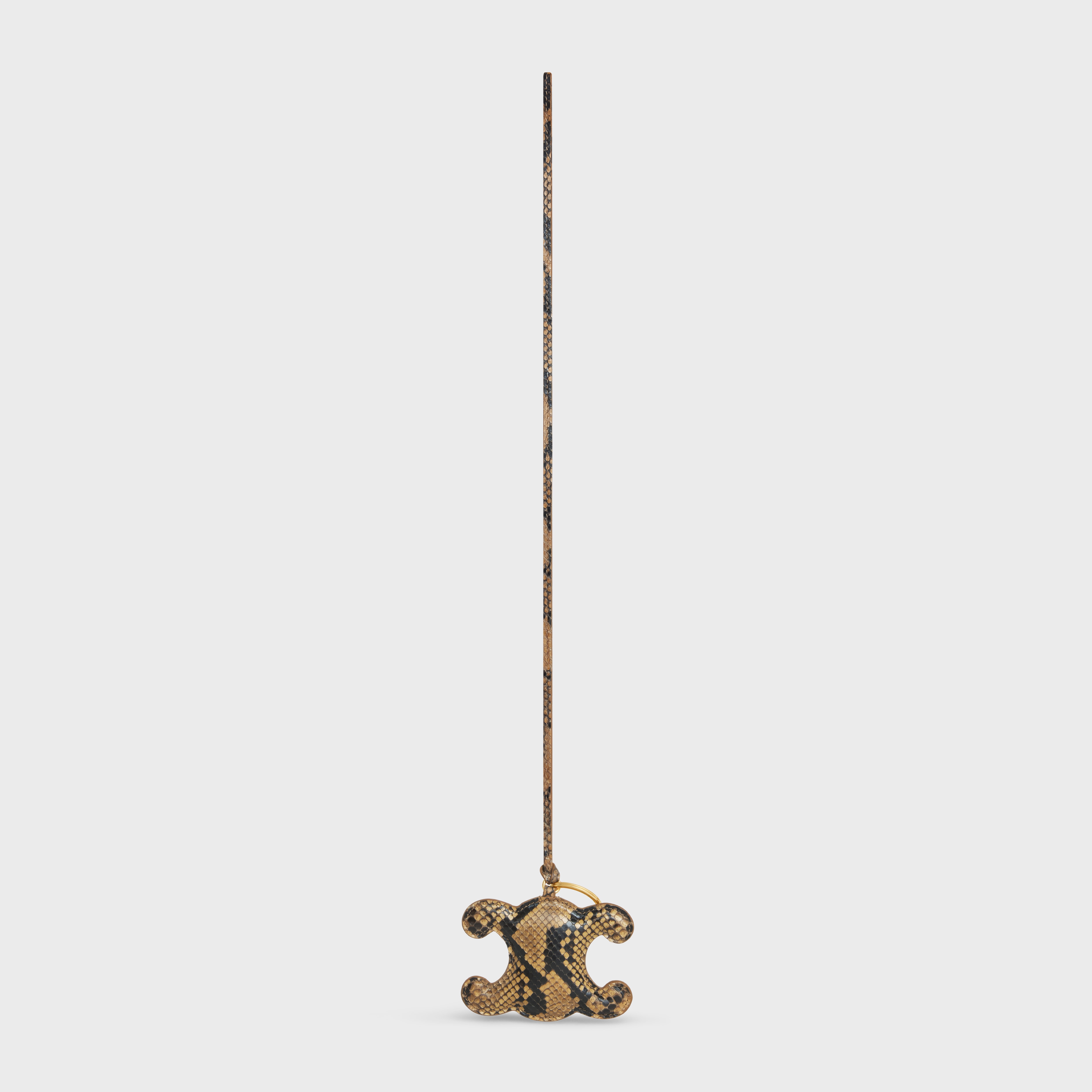 TRIOMPHE pom-pom keyring in PYTHON with Gold Finishing - 2