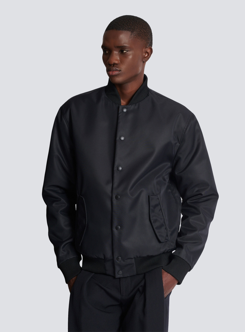 Reversible bomber jacket in plain and Kiss-print nylon 8