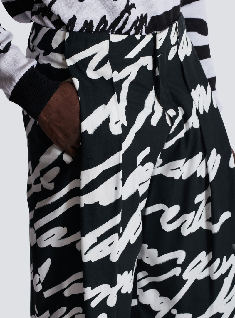 Pleated trousers with "Love Letter" print 7