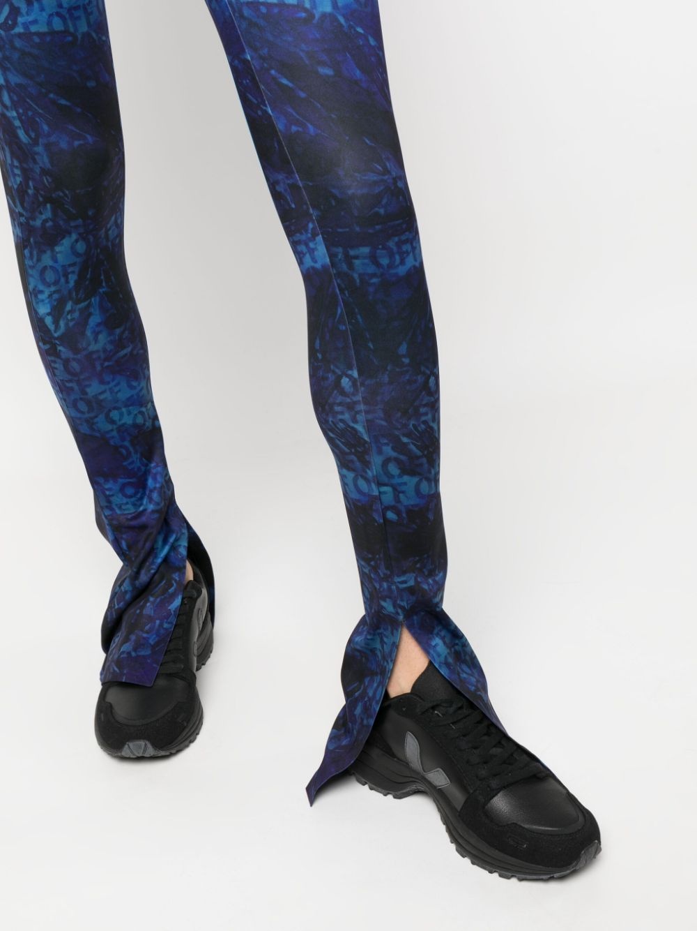 all-over logo-print flared trousers - 5