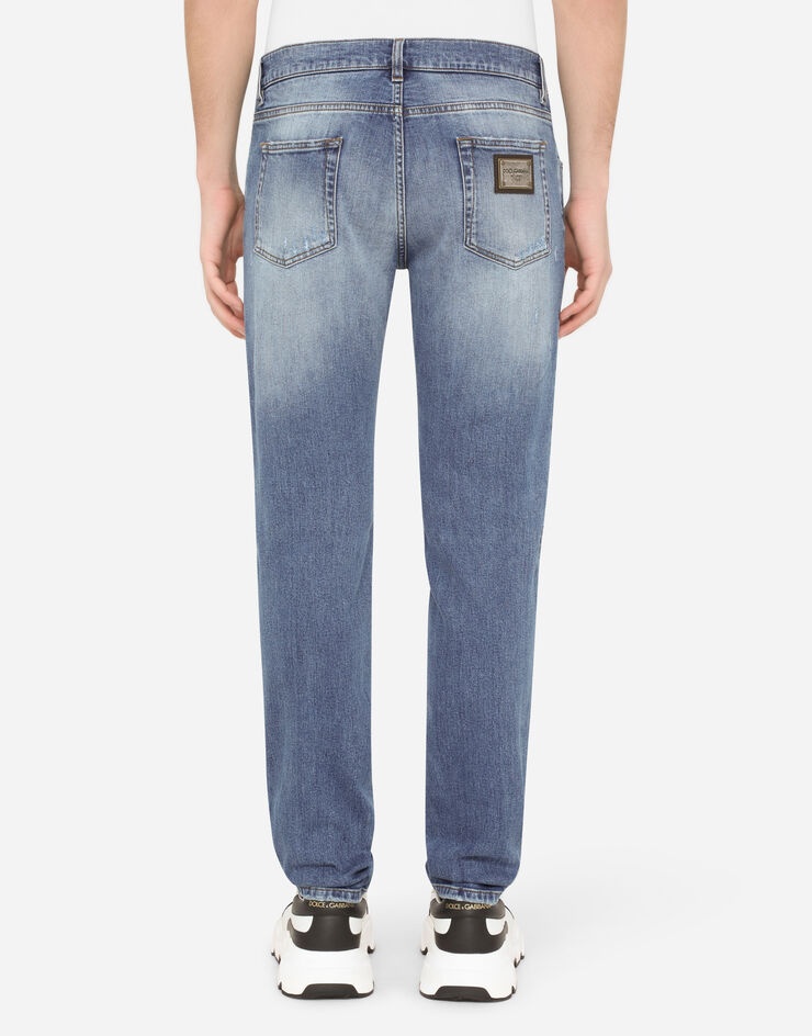 Slim-fit stretch jeans with repaired rips - 2