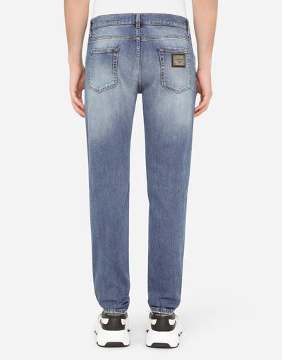 Dolce & Gabbana Slim-fit stretch jeans with repaired rips outlook