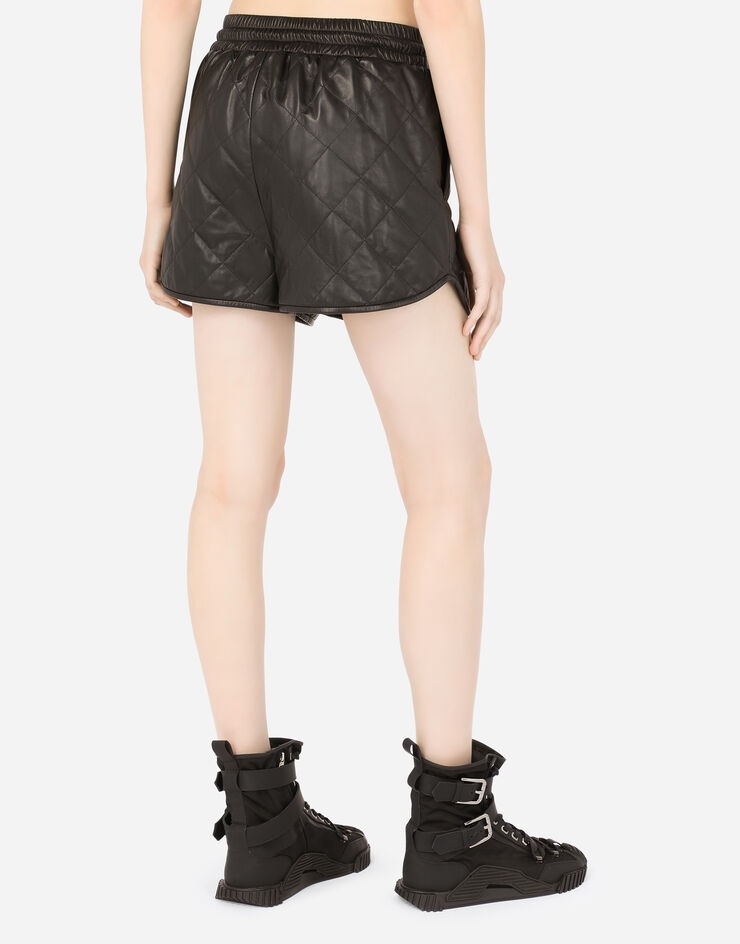 Quilted leather shorts with DG pendant - 5