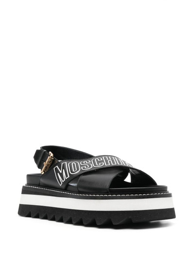 Moschino logo-print leather platform sandals outlook