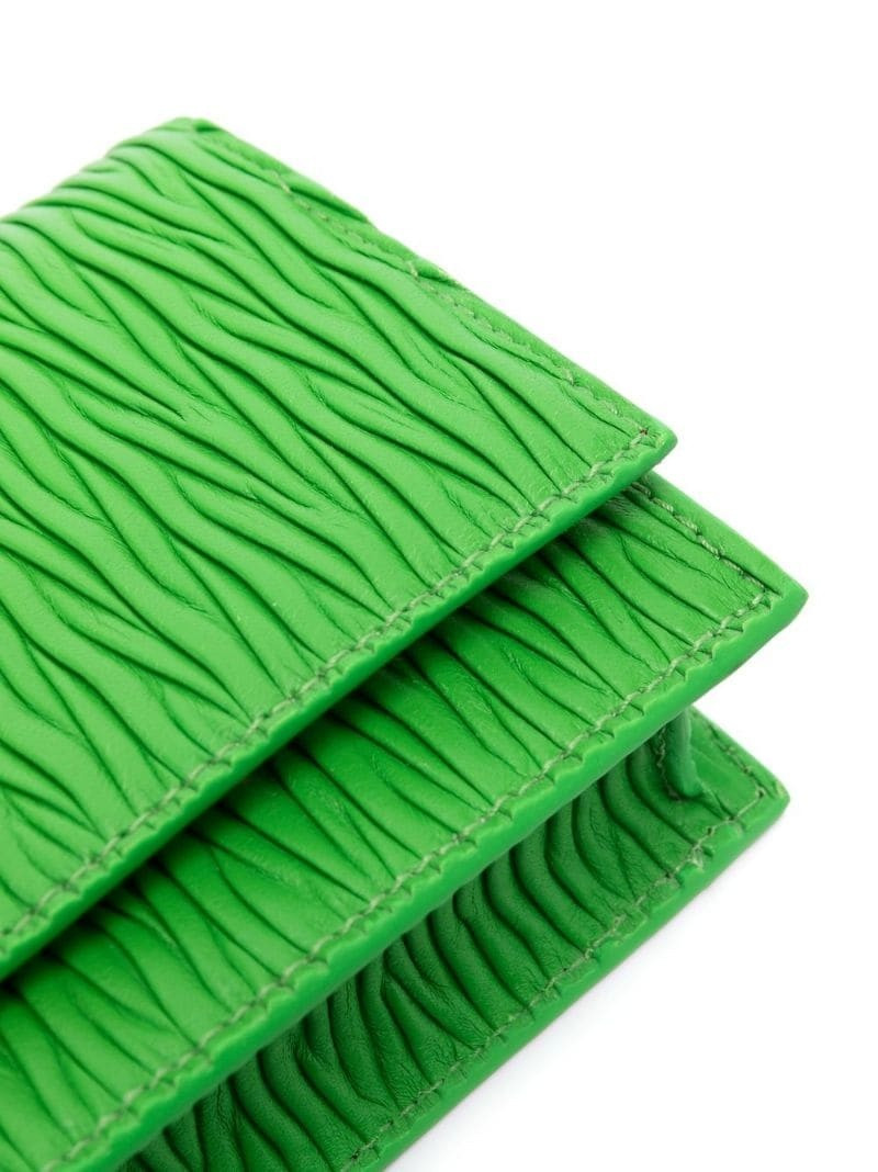 skull-stud pleated leather bag 4